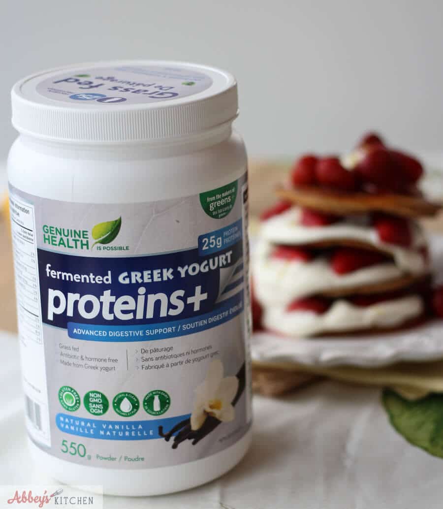 A bottle of Genuine Health protein powder.