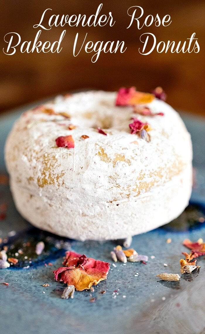 A close up of a lavender rose baked donuts.