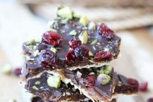 An angled image of a stack of passover matzo brittle with salted coconut sugar caramel.
