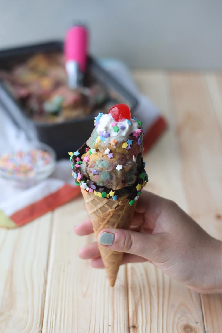 Unicorn nice cream served in a cone.