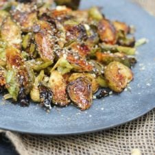 I'm spicing things up for Thanksgiving by serving up my tasty vegan and gluten free sweet chili roasted brussels sprouts side dish.