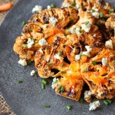 These easy vegetarian gluten free buffalo cauliflower steaks are the perfect dish for a healthy meatless dinner option.