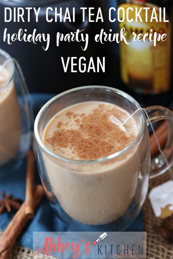 pinterest image of Chai cocktail in a glass mug garnished with cinnamon with text overlay