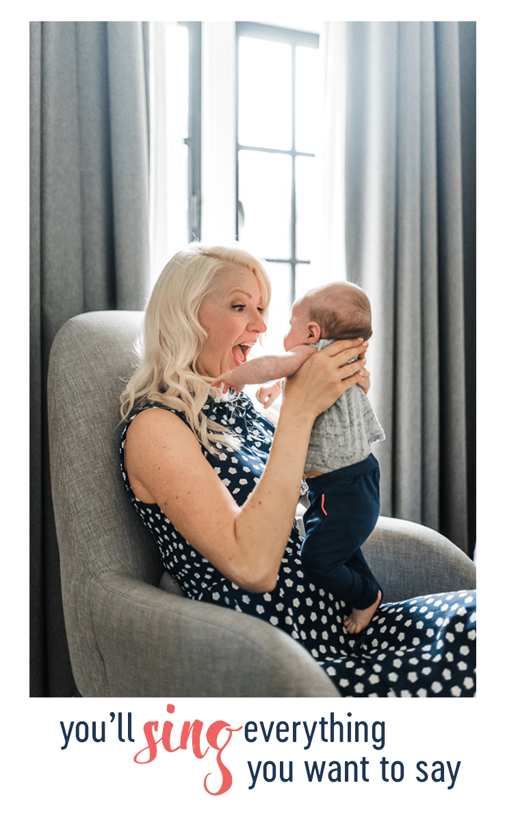 abbey holding baby E on a chair
