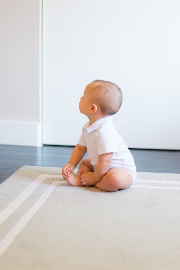 baby sitting on the floor
