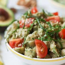 Avocado pasta in a small bowl.