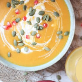 Orange soup in a bowl.