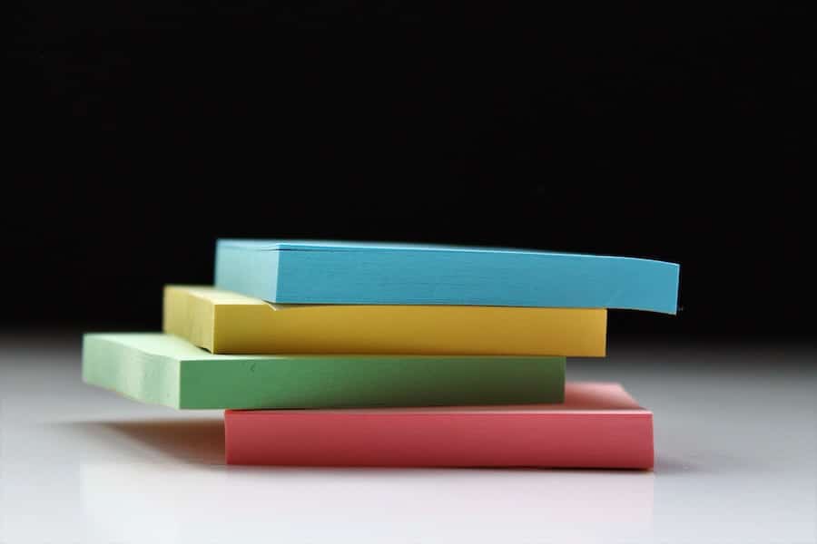 Stack of sticky notes for intuitive eating homework.