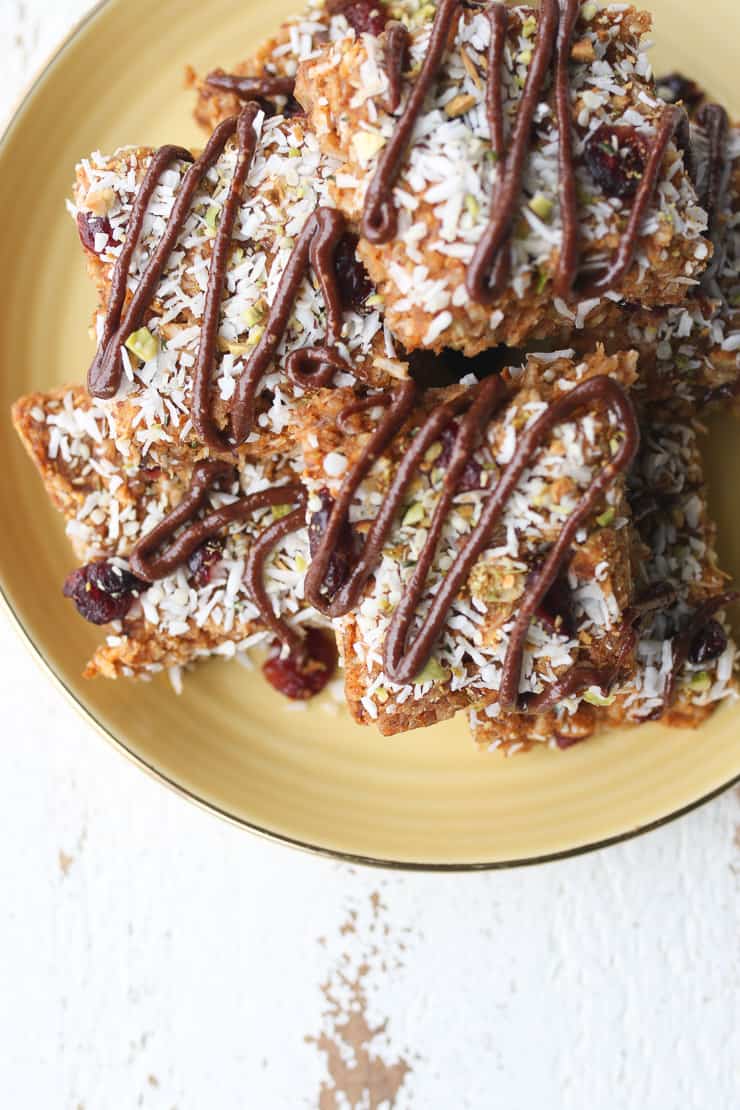 Birds eye view of sweet potato bars on a yellow plate.