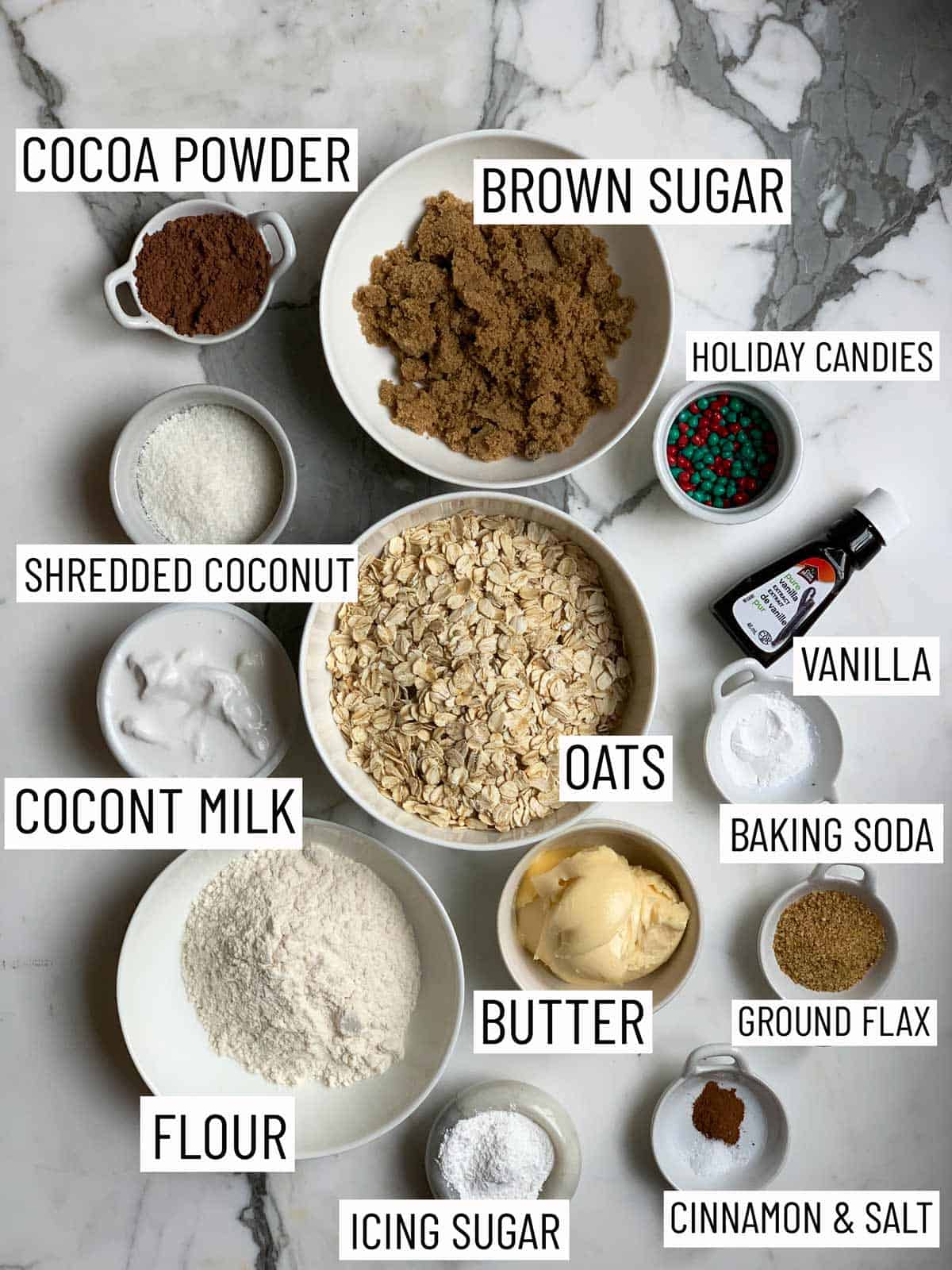 Overhead image of ingredients required to make cookie cups on a marble surface.