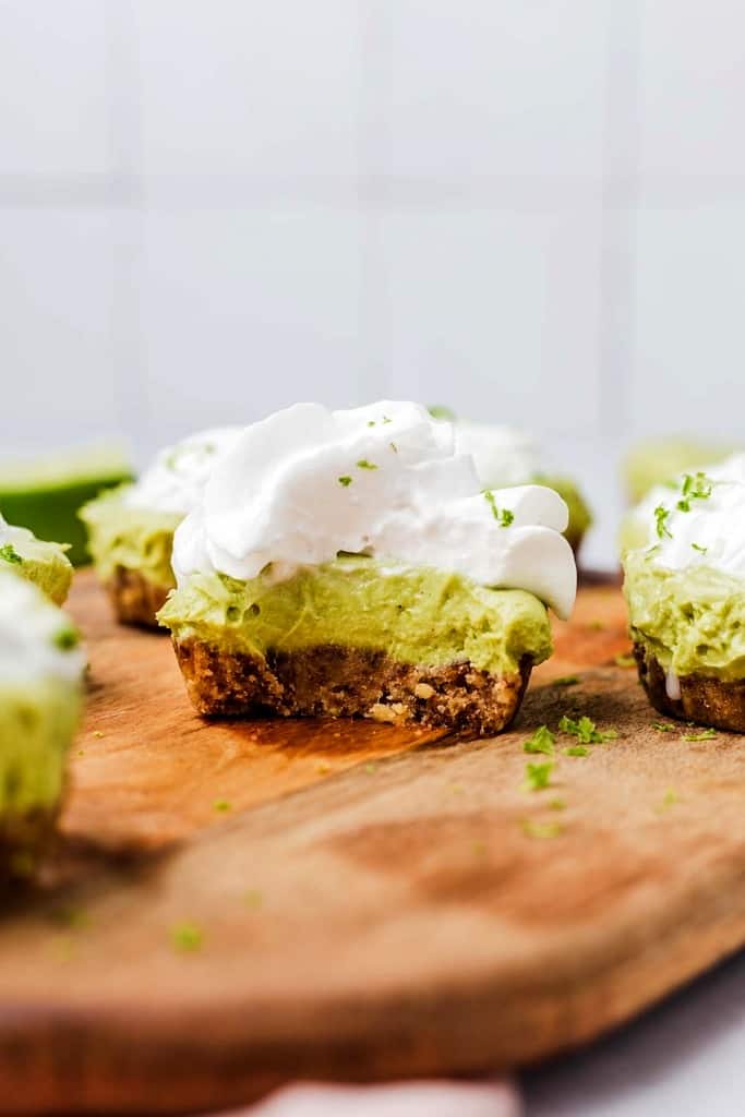 A mini no-bake pie with a bite taken out of it.