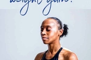 Pinterest graphic of a woman doing yoga with the text overlay "registered dietitian explains does cortisol cause weight gain?"