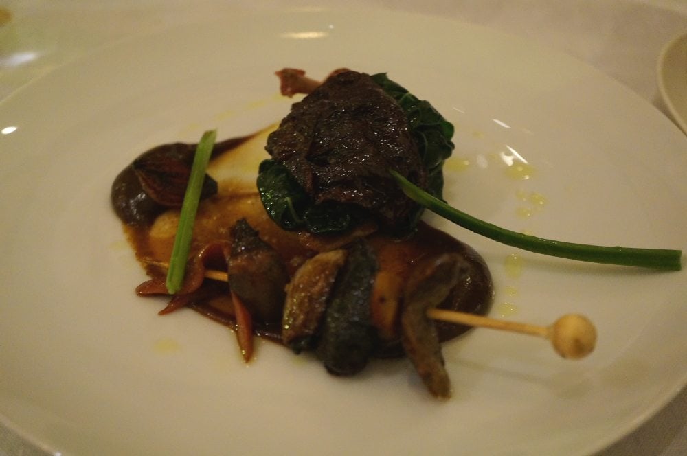 A plate of roasted squab pigeon,